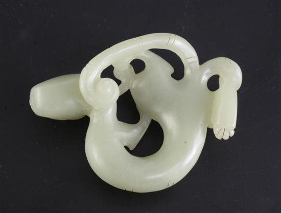 A Chinese celadon jade figure of a chi-dragon, 18th / 19th century, length 6.8cm